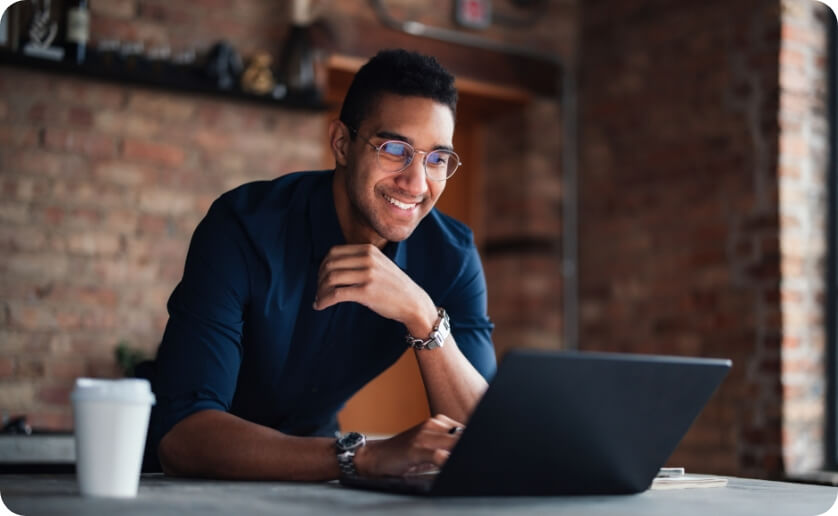 Team member working on a laptop