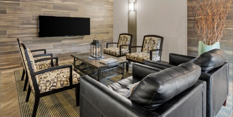 Community lounge with seating and television